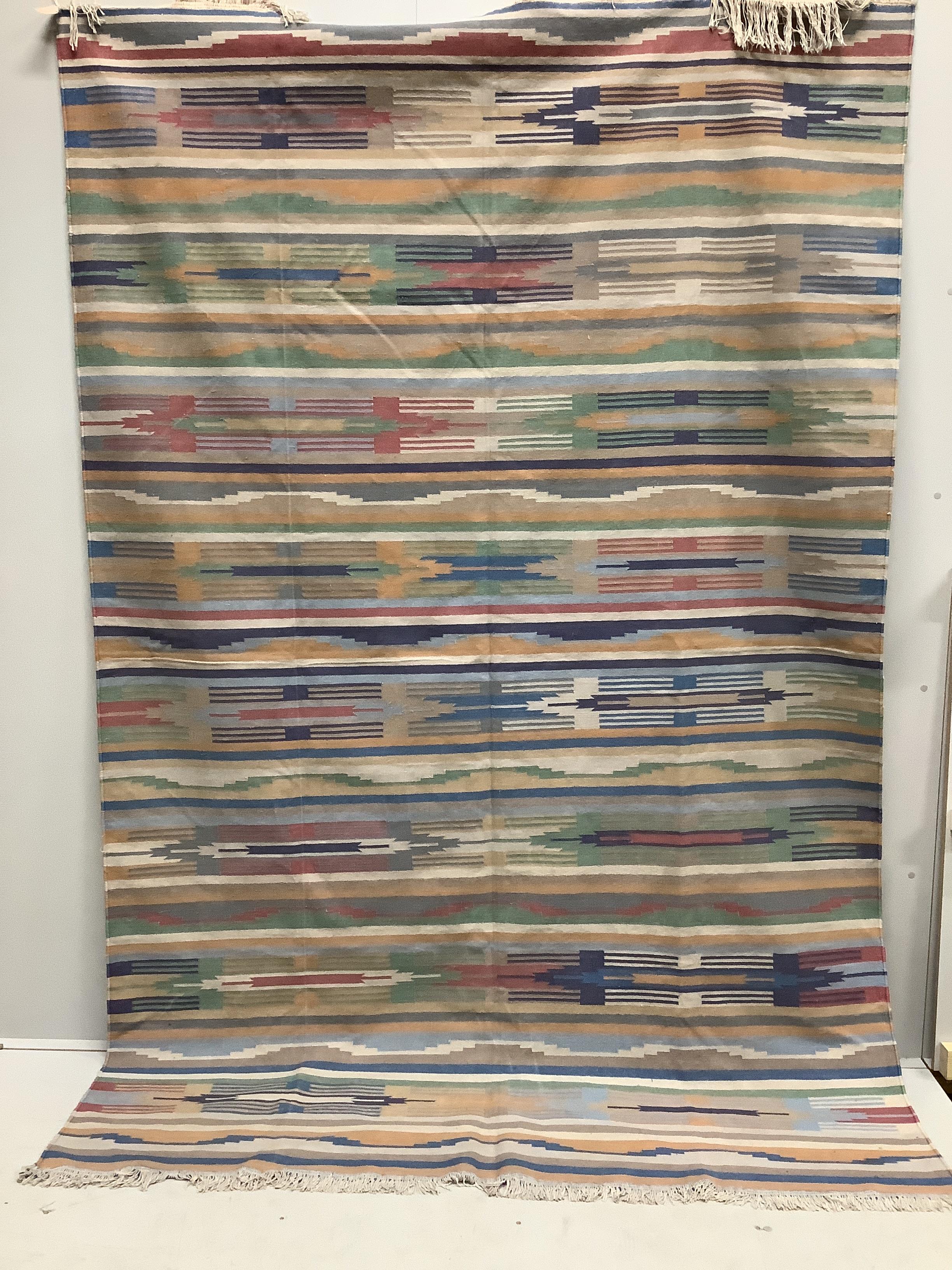 A Kilim polychrome flatweave carpet, 270cm x 180cm